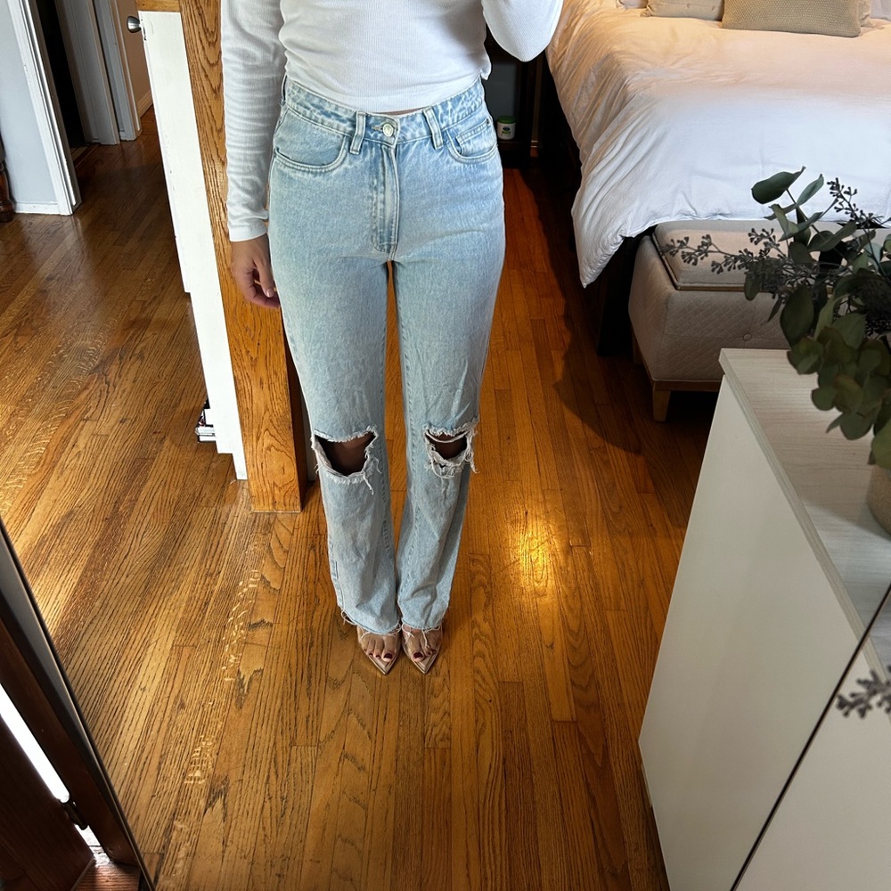 Weworewhat- light wash distressed wide leg jeans. Size 27